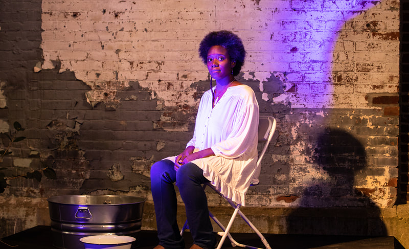 FIRE FLOWERS AND A​ ​TIME MACHINE // FLORES DE FUEGO Y UNA MÁQUINA DEL TIEMPO by Shey Rivera Ríos, presented by The Wilbury Theatre Group in collaboration with WaterFire Providence; photo by Erin X. Smithers. (Providence, RI)