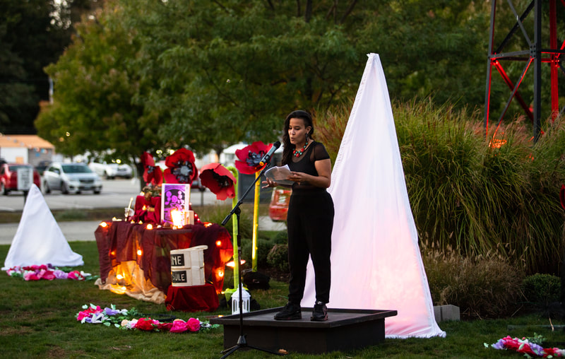 FIRE FLOWERS AND A​ ​TIME MACHINE // FLORES DE FUEGO Y UNA MÁQUINA DEL TIEMPO by Shey Rivera Ríos, presented by The Wilbury Theatre Group in collaboration with WaterFire Providence; photo by Erin X. Smithers. (Providence, RI)