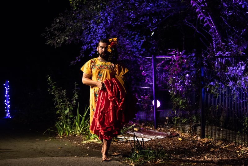FIRE FLOWERS AND A​ ​TIME MACHINE // FLORES DE FUEGO Y UNA MÁQUINA DEL TIEMPO by Shey Rivera Ríos, presented by The Wilbury Theatre Group in collaboration with WaterFire Providence; photo by Erin X. Smithers. (Providence, RI)
