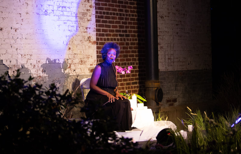 FIRE FLOWERS AND A​ ​TIME MACHINE // FLORES DE FUEGO Y UNA MÁQUINA DEL TIEMPO by Shey Rivera Ríos, presented by The Wilbury Theatre Group in collaboration with WaterFire Providence; photo by Erin X. Smithers. (Providence, RI)